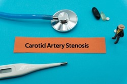 Carotid Artery Stenosis.The word is written on a slip of colored paper. health terms, health care words, medical terminology. wellness Buzzwords. disease acronyms.
