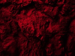 Red Close up rocks. Dark Stone texture.                                  