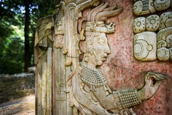 Detail of a bas-relief carving in the ancient Mayan city of Palenque, Chiapas, Mexico