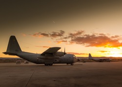 Photograph of a Hercules aircraft on land,ready to take off