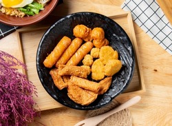 Deluxe fried food platter served in a dish isolated on table top view of chinese food