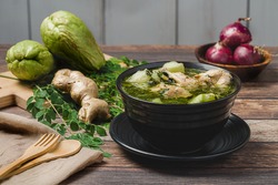 Tinola (Zoom Out)- a famous Filipino vegetable soup dish that is usually made from ginger, fish sauce and chicken broth, usually mixed with  moringa (malunggay) and chayote