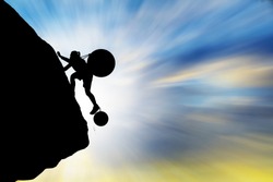 Silhouette woman climbing the mountain with large steel balls ,Concept problem and challenge.