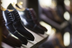 Men shoes in a luxury store in Paris.