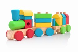 Stacking Train Toddler Toy for little children, isolated on white background with shadow reflection. Baby train made of wooden geometric blocks. Colorful wooden stacking train for kids on white 