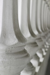 classic style balcony concrete pillar railing standing in a row