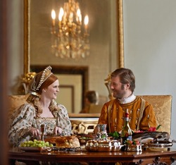 High tea with the Duchess. A regal king and queen enjoying a meal together.