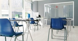 A benchmark for success. Shot of an empty, neatly arranged exam room ready to be used.