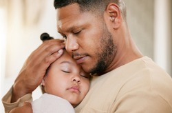Father carrying his sleeping daughter, hugging and bonding with affection at home. Caring parent enjoying fatherhood, holding his girl child, enjoying quiet moment of care, consoling and safety
