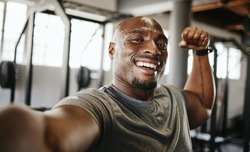 man, strong and fitness selfie, gym and exercise portrait, after workout and weight training, happy and flexing arm. Cardio, endurance and smile, sweat for sport and bicep photo, wellness.