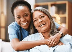 Senior care, hug and portrait of nurse with patient for medical help, healthcare or physiotherapy. Charity, volunteer caregiver and face of black woman at nursing home for disability rehabilitation