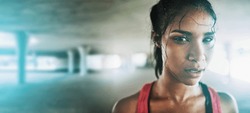 Fitness, woman in portrait with face and mockup space, exercise and runner outdoor with wellness and energy. Intense, sweat and cardio with run, body workout and sports motivation in parking lot