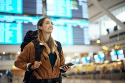 Travel, airport and excited woman with passport. travel ticket and documents for immigration, journey and flight schedule. Backpack person with identity document search for international registration