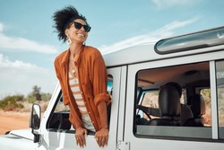 Black woman on road, enjoying window view of desert and traveling in suv on holiday road trip of South Africa. Travel adventure drive, happy summer vacation and explore freedom of nature in the sun