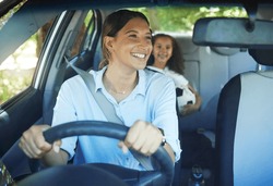 Travel, mother and child in car for drive, fun and sports, soccer and adventure, happy and excited. Mom, driver and girl passenger in vehicle, smile and bonding on road trip to football activity
