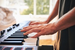 Piano, man and hands on keys for music, creative talent and skills in home studio. Closeup, musician and playing synthesizer keyboard for audio performance, sound artist and learning instrument notes