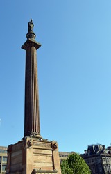 The first ever statue of Sir Walter Scott, on a doric column towering over George Square, Glasgow, Scotland and completed in 1836, the work of  John Greenshields and A Handyside Ritchie.