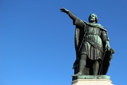 Statue of the famous rebel leader Jacob van Artevelde, known as The Wise Man, in Ghent against a clear blue background