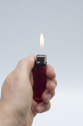 a lighter in hand