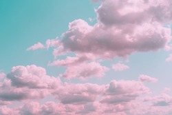 Aesthetic background with beautiful turquoise sky with pink clouds and circle light frame. Minimal creative concept of angel paradise