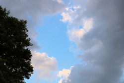cloudscape trees cloudy sky clouds blue sky