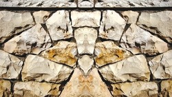 Stone Pattern. Symmetrical Photo Background of Old Vintage Stonewall. Geometrical stone figure. Stock Photo
