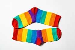 pair of rainbow-colored socks. Symbol LGBT