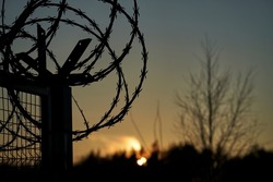 Barbed wire fence and Light of Hope.