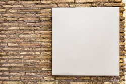 mock up blank white square canvas, small billboard for advertisement sales marketing strategy sign direction and information detail for adds, on brick wall in public area, for graphics logo and design
