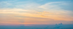 Panorama photo of clouds or cloudscape at sunset or evening time. with blue sky.