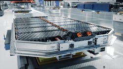 Generic EV Battery Pack on Electric Car Production Line inside Modern Factory. High Capacity Battery for Automotive Industry. Lithium-ion High-voltage Battery for Electric Vehicle or Hybrid Car.