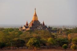 A large stupa of a Buddhist temple in the city of a thousand stupas of Pagan in Myanmar