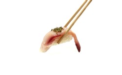 Sushi  Japanese amberjack Sashimi, sliced hamachi, placed on ice in a bowl.