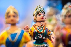 Face of a Thanjavur dancing doll (Called as Thalaiyatti Bommai in Tamil language) with look alike traditional dress