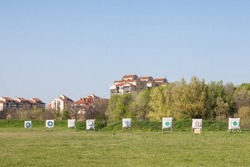 Archery target, also called bullseye target, in an archers field, used for practicing archery, outdoors.