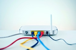 WiFi Router with Internet  Cable Connection in white background, Color full Cable, Ethernet Cable, LAN connection, Network Router, Server Internet Connected with LAN cables,