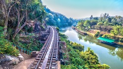 Tham Krasae railway landmark of Kanchanaburi. the whole world knows Death Railway Bridge in wold war two.During World War Two Japan constructed railway from Thailand to Burma