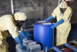 Experts disposing infested material