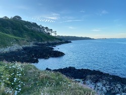 Scenic sky over cliffs and sea in Guernsey