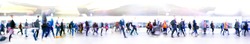 Lots of business people walking in big open space, transport station, airport etc. Blurred image, wide panoramic view with people at rush time. London, UK