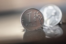 Ruble and dollar. US Coin 5 cents. one ruble. currency exchange rate. ruble exchange rate