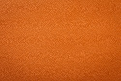 Synthetic leather brown background texture. Brown leather textured background.