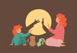 Bedtime story. Cute shadow theatre. Mother with child play in the shadows theatre. Children development concept.