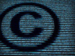 Copyright symbol in digital background / A concept of intellectual property in technology