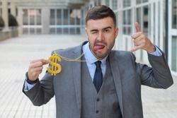 Businessman rocking golden necklace with dollar sign 