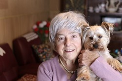 Older woman and her lap dog