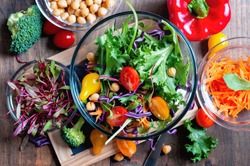 Chickpea and veggies salad with micro greens, healthy homemade vegan food, vegetarian diet, vitamin snack