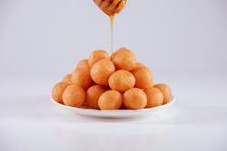 Luqaimat with honey oriental food