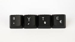 Byte text created with keyboard keys isolated on white background, computer terminology, white byte on black keyboard, top view