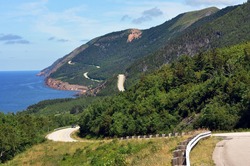 The winding highway of the world famous Cabot Trail along the coast of Cape Breton, Nova Scotia